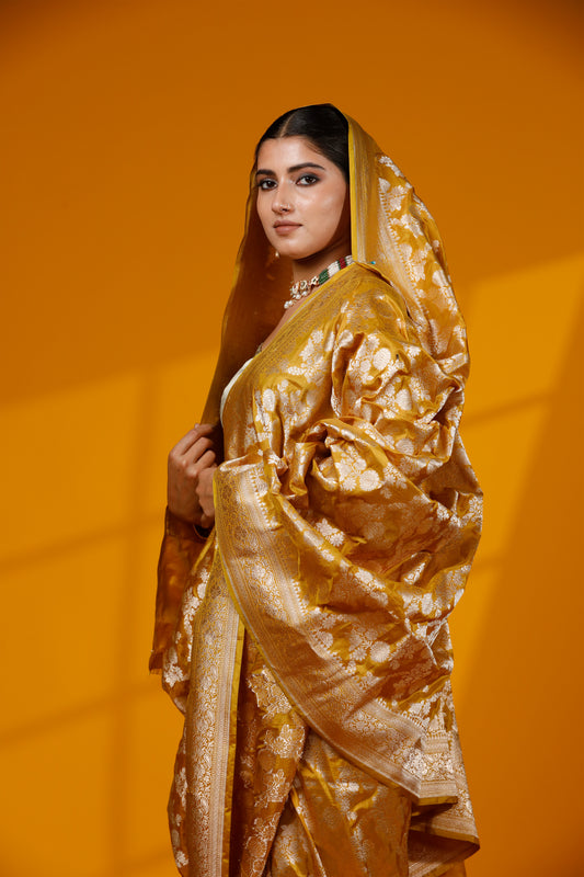 Yellow pure Silk Banarasi Handloom saree with intricate jangla patterns