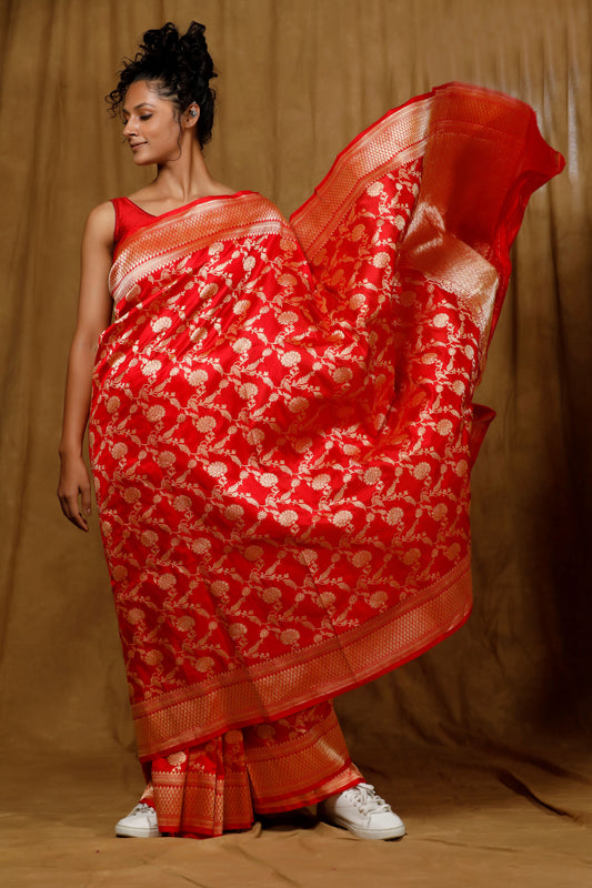 Red Banarasi saree features intricate kadhua jaal