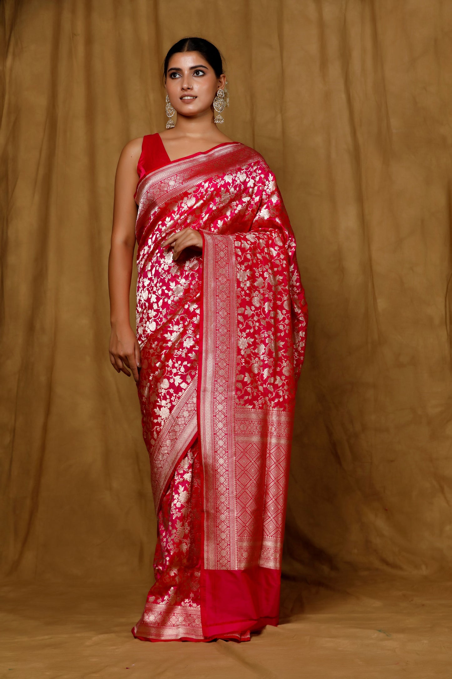Rani color Banaras Handloomi saree with intricate jangla patterns